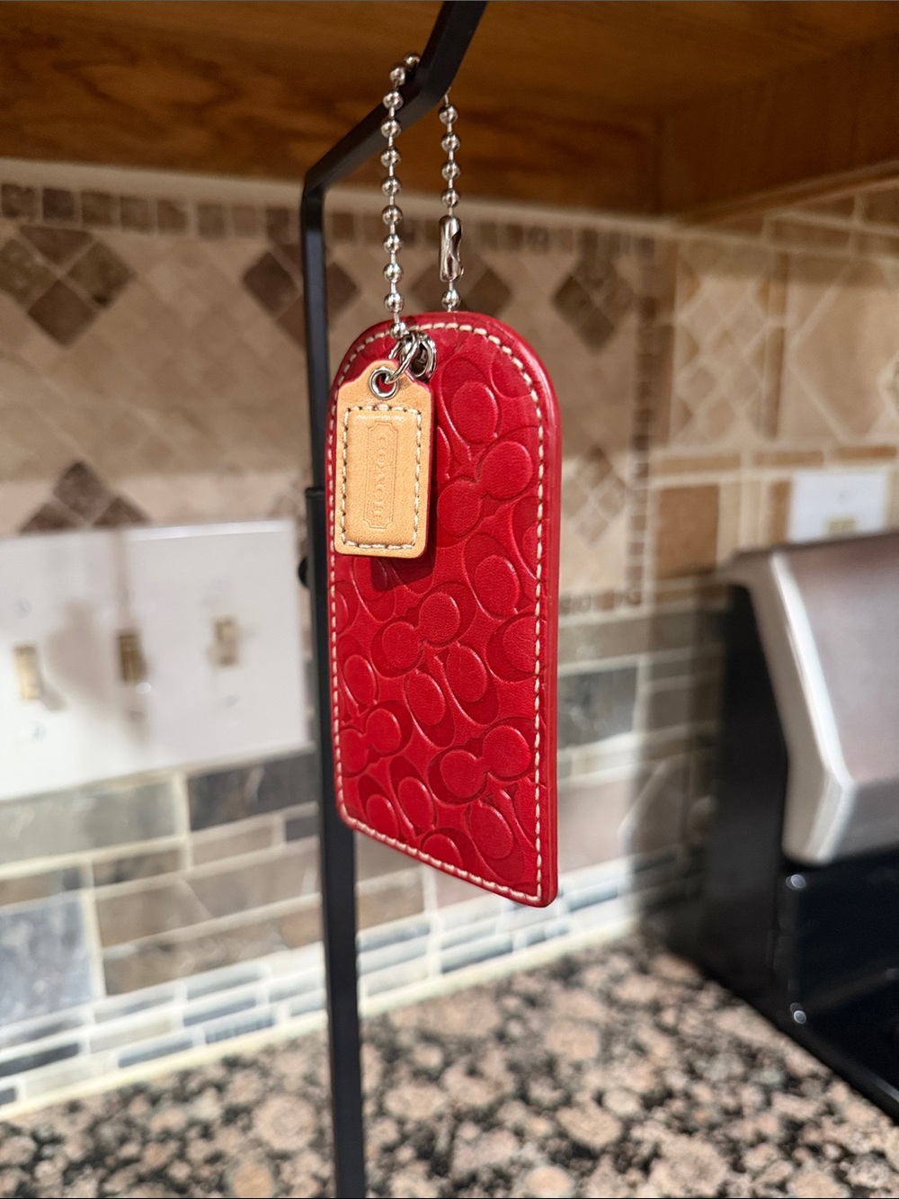 Coach Red Embossed Leather Tag with Tan Logo Tab